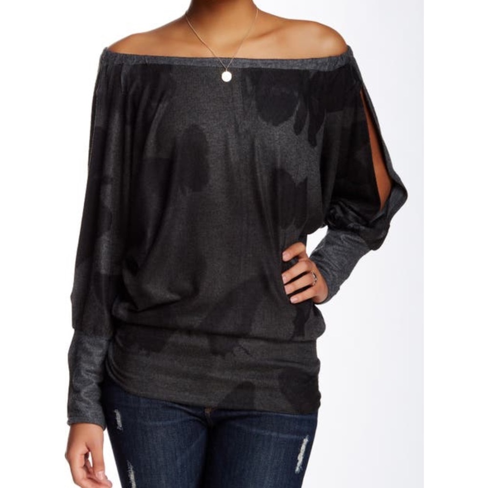 Off shoulder, bat/wing sweater. Size L.